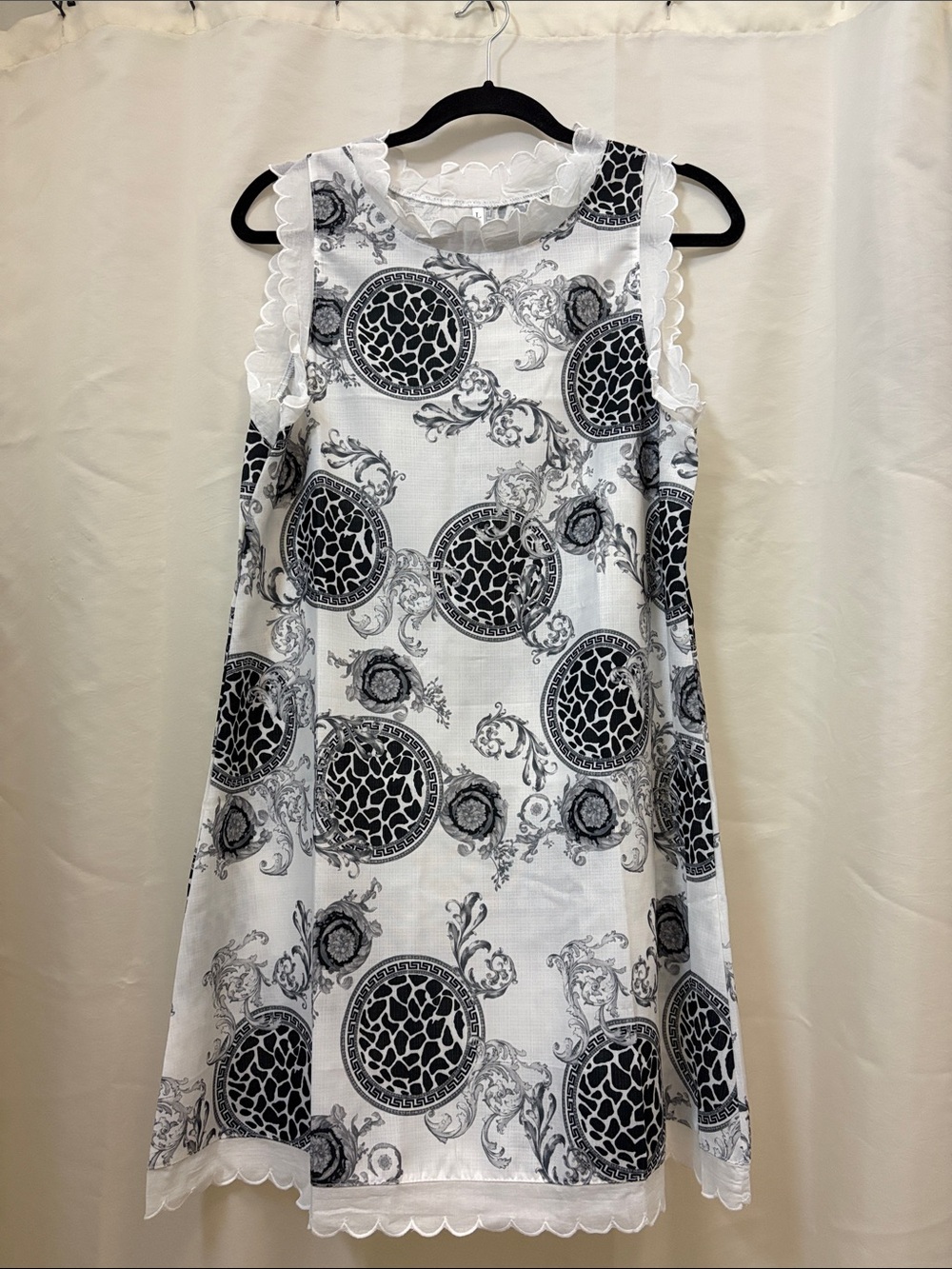 Sleeveless White Mini Dress with Black Medallion Print